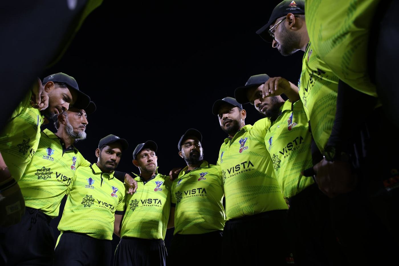 A VPL team talk under lights